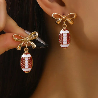 Rhinestone Football Bow Earrings image 0